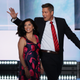 Rep. Sean Duffy (R-Wis.) with his wife, Rachel Campos-Duffy, walk onstage to deliver a speech on the first day of the Republican National Convention on July 18, 2016, at the Quicken Loans Arena in Cleveland.